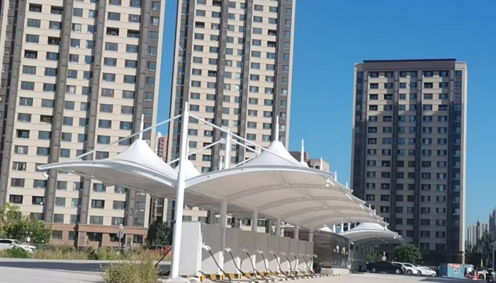 精心打造每一个细节，为您带来充电桩车棚景观膜汽车、自行车棚通道遮阳棚的使用体验！